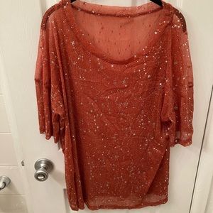 Sheer red small top with silver star accents